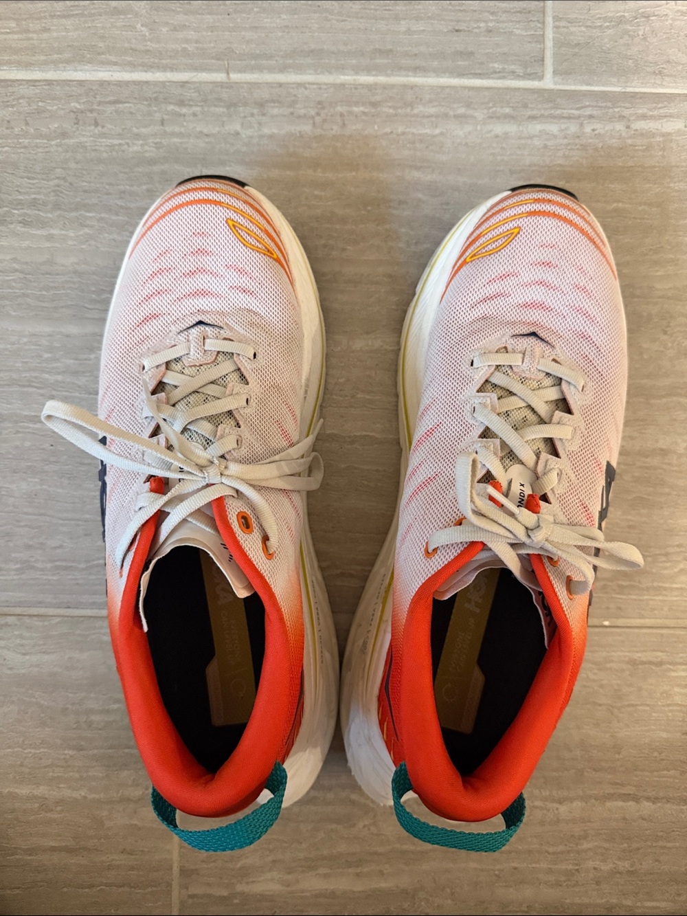 HOKA Bondi 8 in Blanc de Blanc / Solar Flare—the white/orange colorway